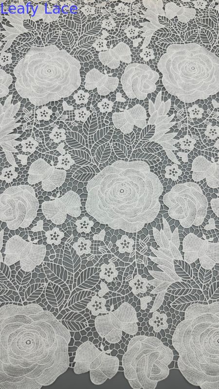 Delicate White Embroidered Lace Fabric for Stunning Garments and Home Decor