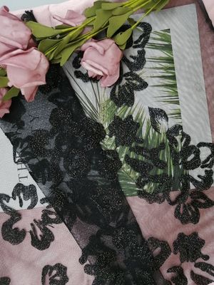 Το μαύρο λεπτό σχοινόδετο τρισδιάστατο Floral ύφασμα δαντελλών κέντησε το νυφικό ύφασμα